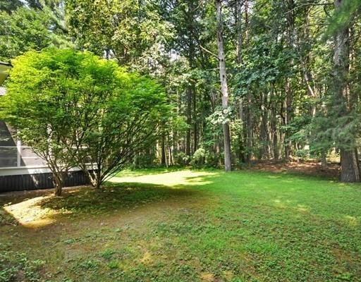 256 Hunters Ridge Road Concord, MA 01742 - Photo 16 of 16 a view of a trees with a yard