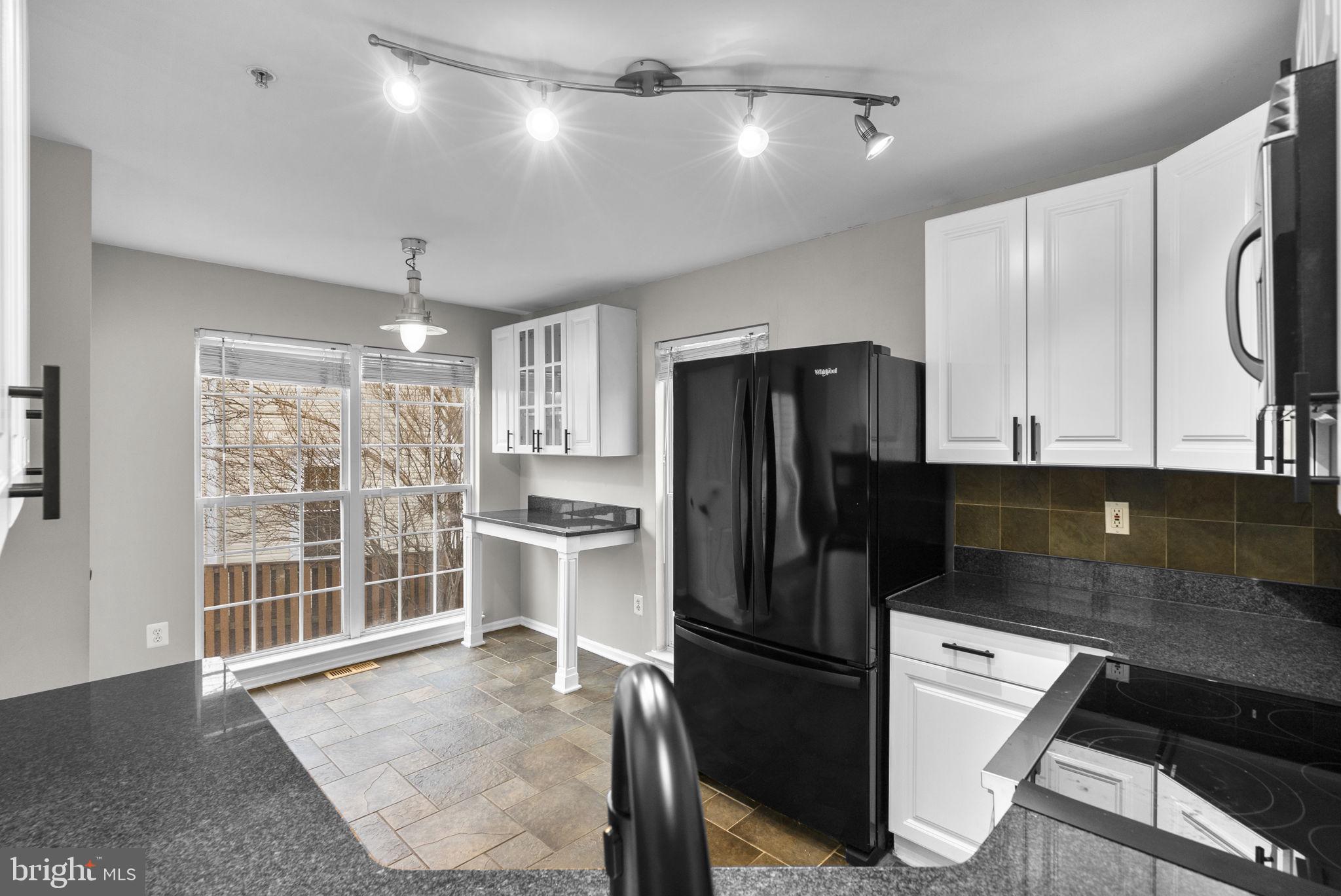 758 Howards Loop Annapolis, MD 21401 - Photo 10 of 64 Kitchen With Windows Overlooking Rear Yard