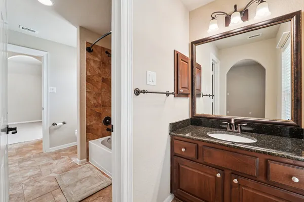 an aerial view of a house with a garden