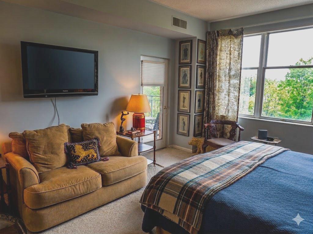 3801 Canterbury Road, Unit 716 Baltimore, MD 21218 - Photo 13 of 30 Primary bedroom with great light & balcony access