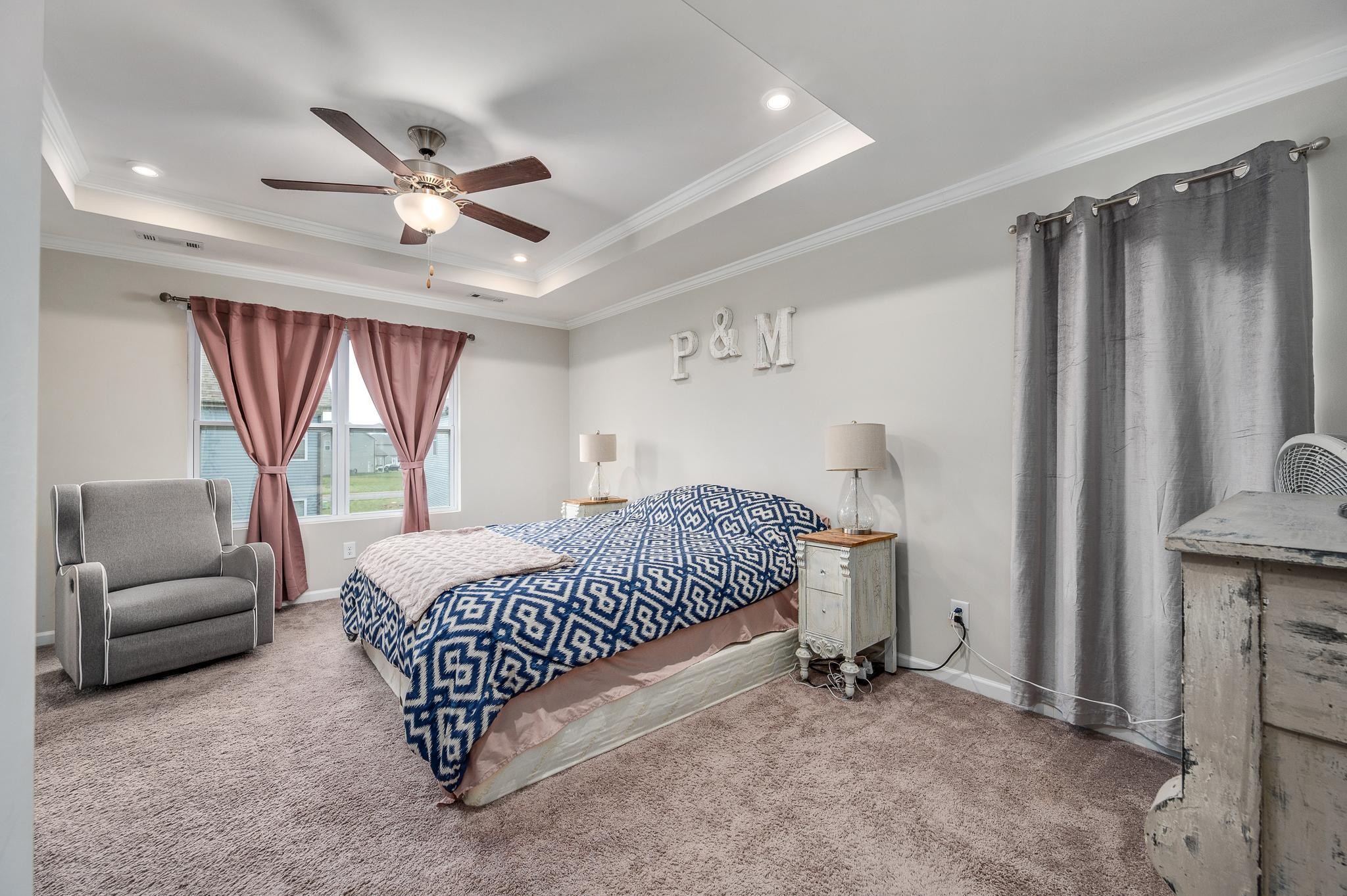 323 Disley Way Murfreesboro, TN 37128 - Photo 22 of 43 a bedroom with a bed couch and window