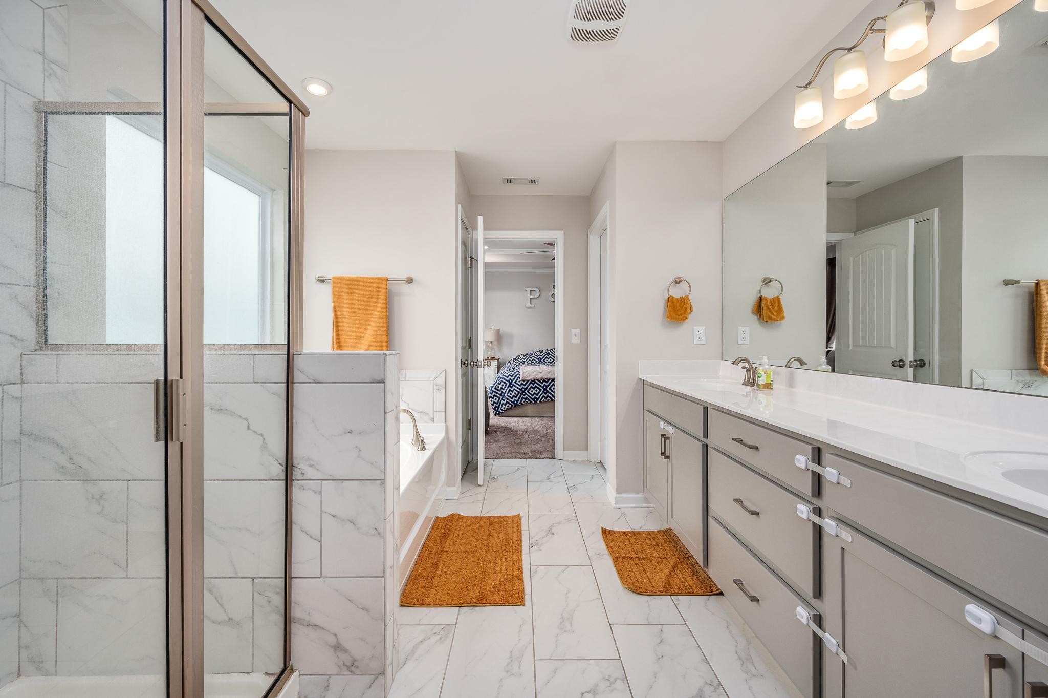 323 Disley Way Murfreesboro, TN 37128 - Photo 28 of 43 a spacious bathroom with a tub shower and sink