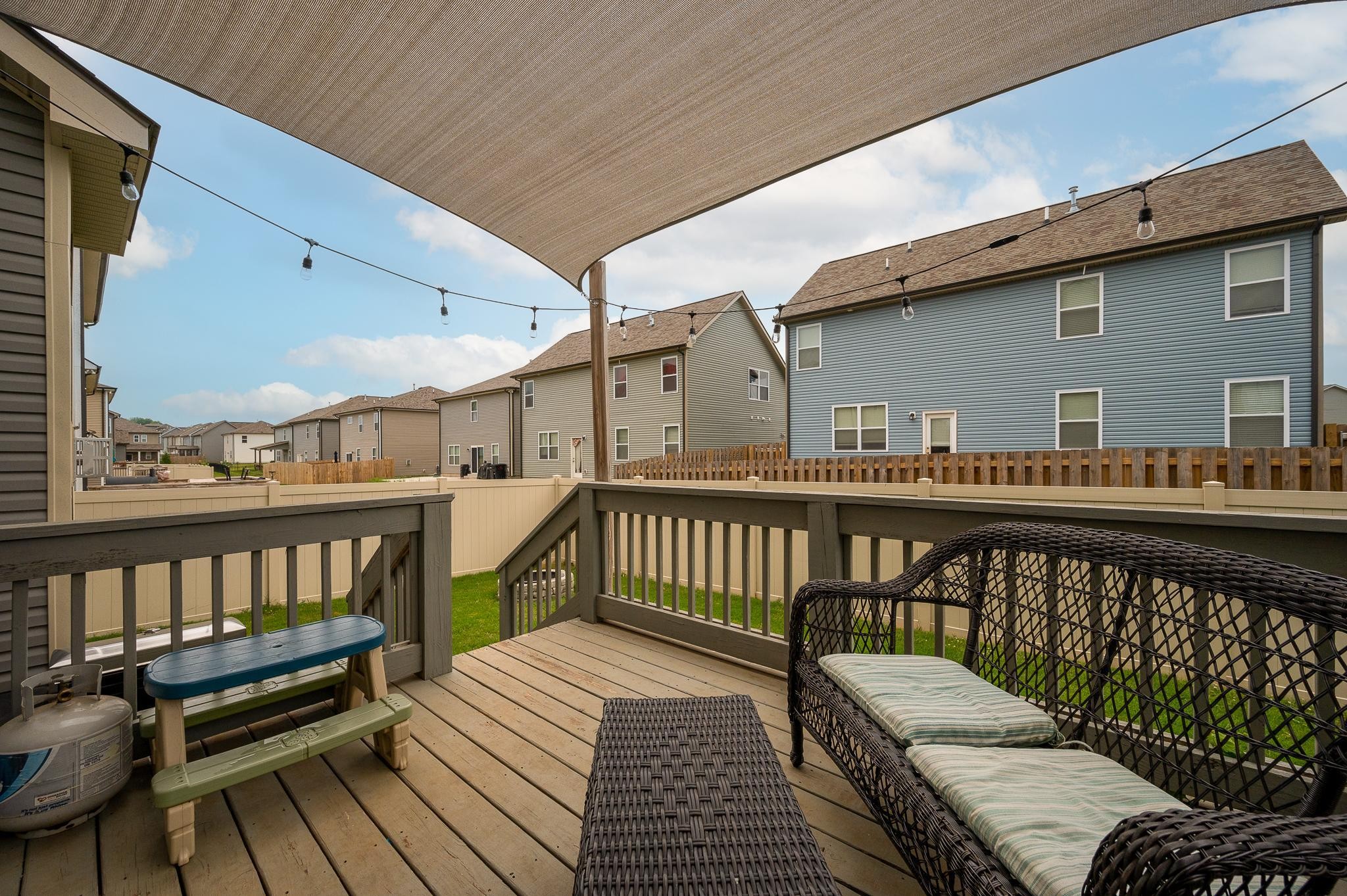323 Disley Way Murfreesboro, TN 37128 - Photo 34 of 43 a roof deck with wooden floor and fence