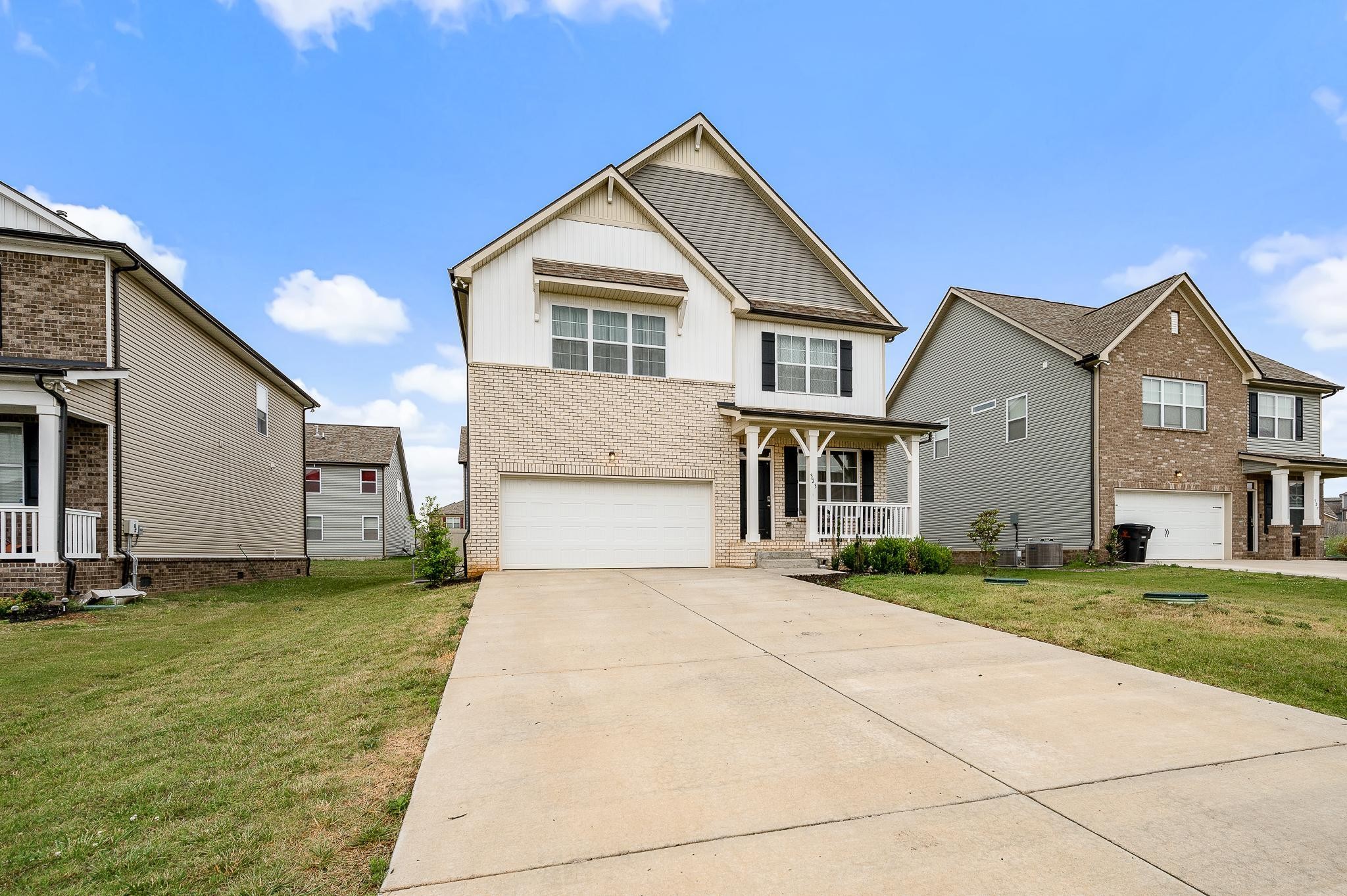 323 Disley Way Murfreesboro, TN 37128 - Photo 5 of 43 a front view of a house with a yard