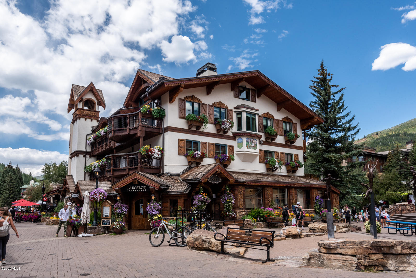 201 Gore Creek Drive, Unit R1 Vail, CO 81657 - Photo 2 of 42 a view of a building with sitting area