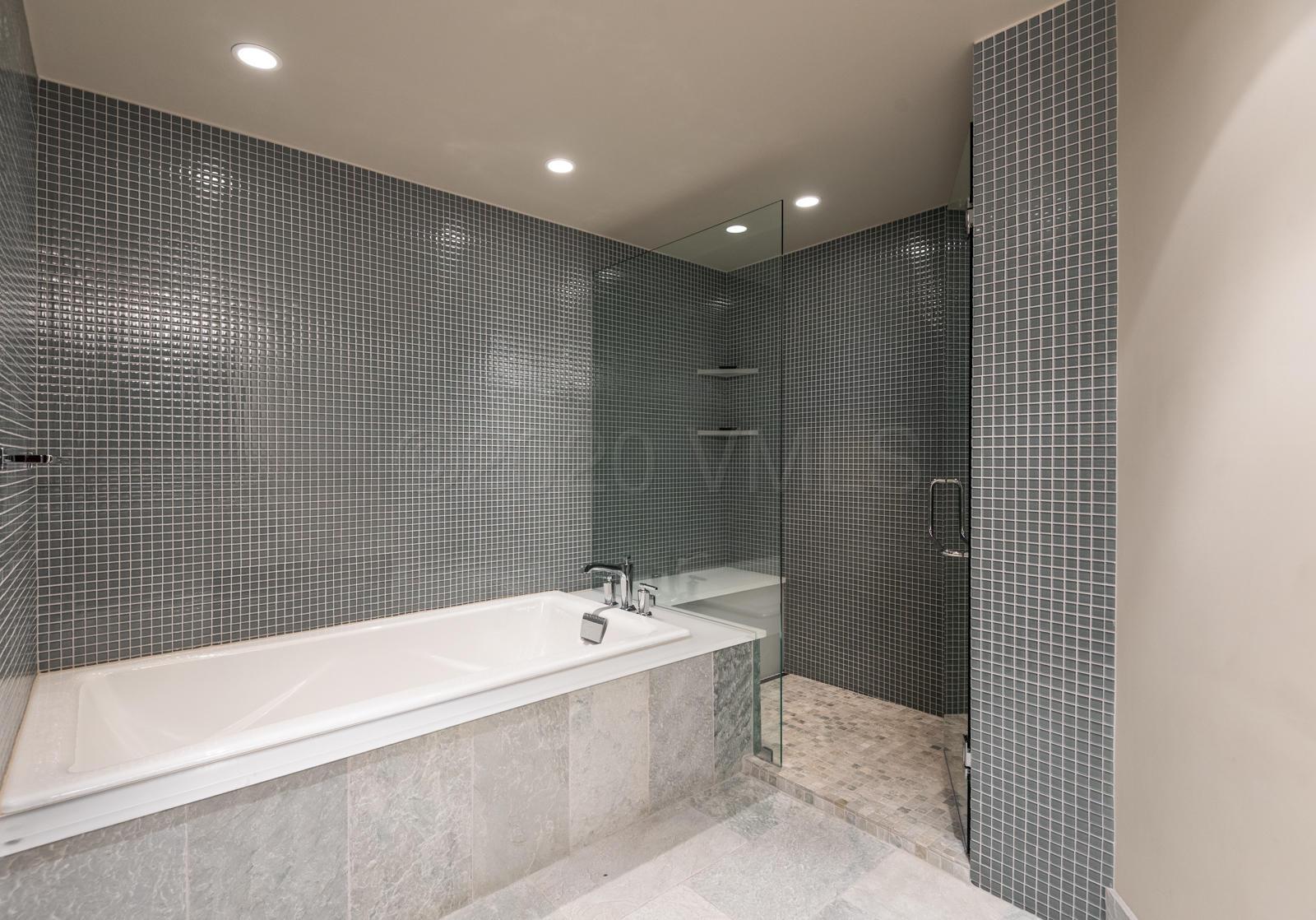 201 Gore Creek Drive, Unit R1 Vail, CO 81657 - Photo 38 of 42 a bathroom with a bathtub and a sink