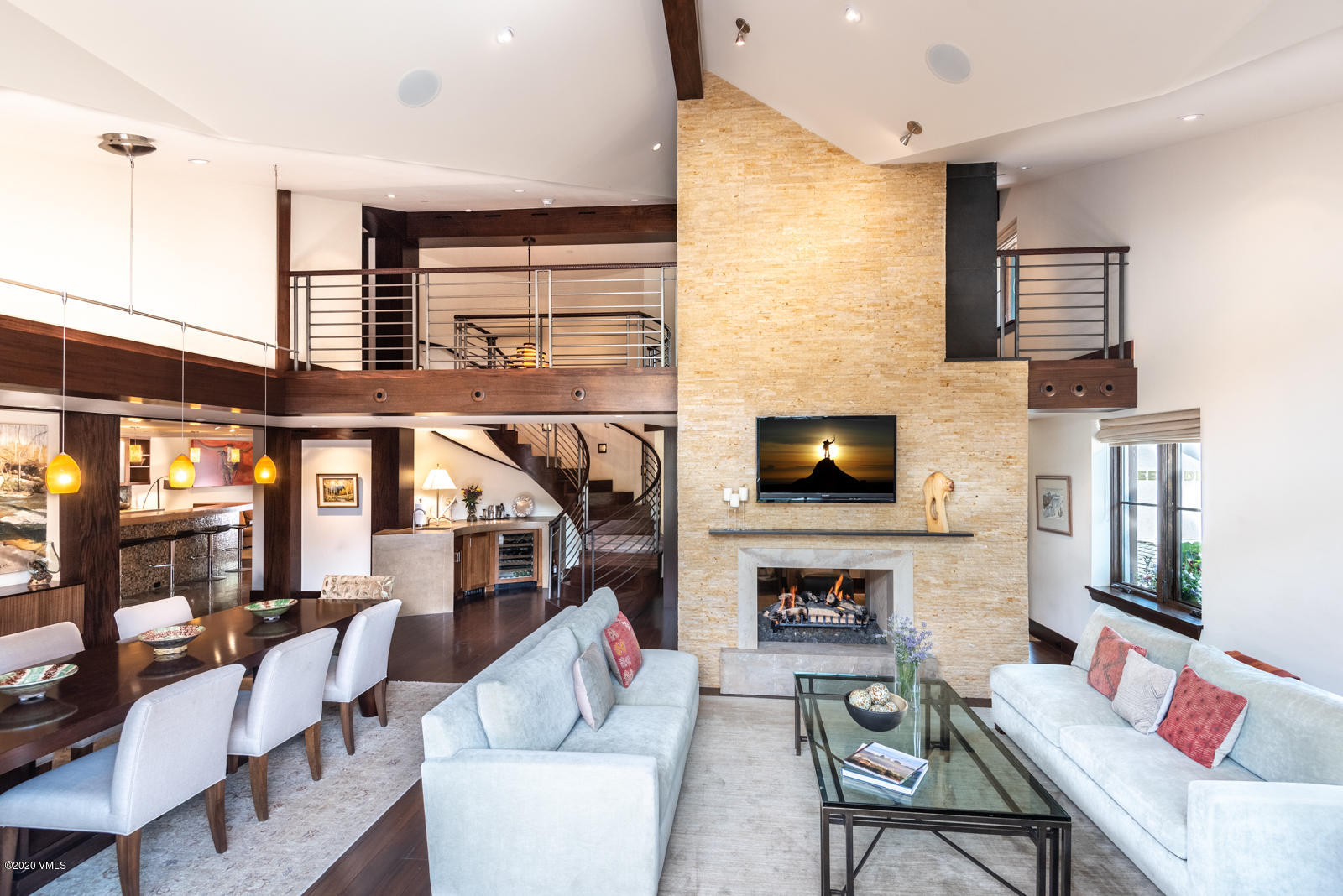 201 Gore Creek Drive, Unit R1 Vail, CO 81657 - Photo 41 of 42 a living room with furniture and a flat screen tv