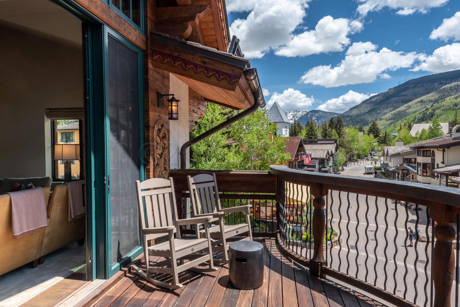 201 Gore Creek Drive, Unit R1 Vail, CO 81657 - Photo 7 of 42 a view of balcony with wooden floor and outdoor seating