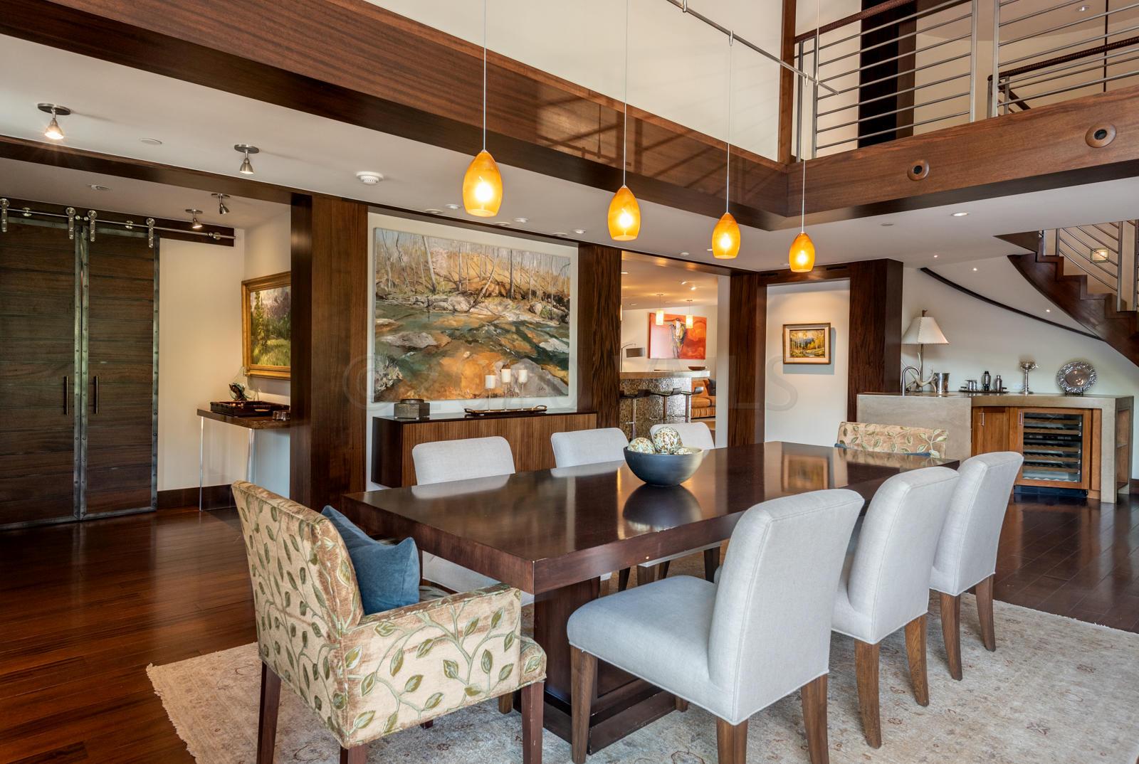 201 Gore Creek Drive, Unit R1 Vail, CO 81657 - Photo 9 of 42 a dining room with furniture and wooden floor