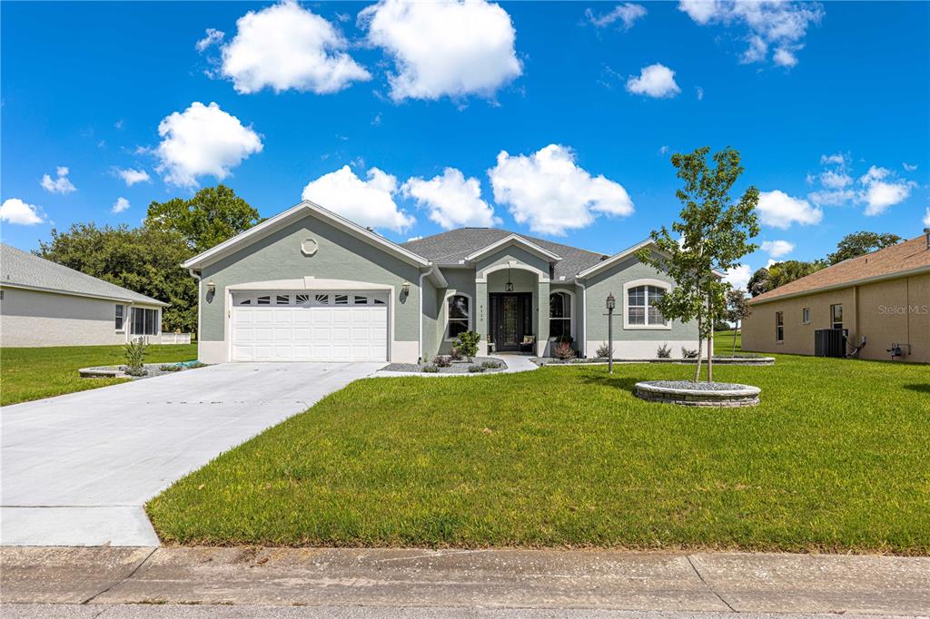 9110 Southwest 96th Court Road Ocala, FL 34481 - Photo 3 of 45 a view of a house with swimming pool