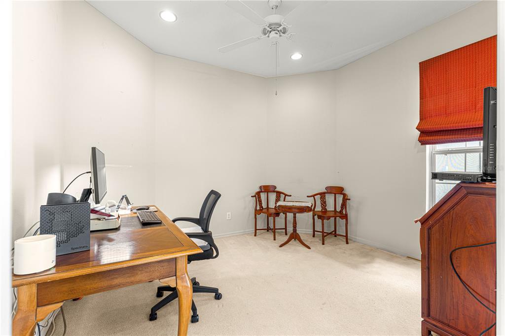 9110 Southwest 96th Court Road Ocala, FL 34481 - Photo 38 of 45 a view of a workspace with furniture