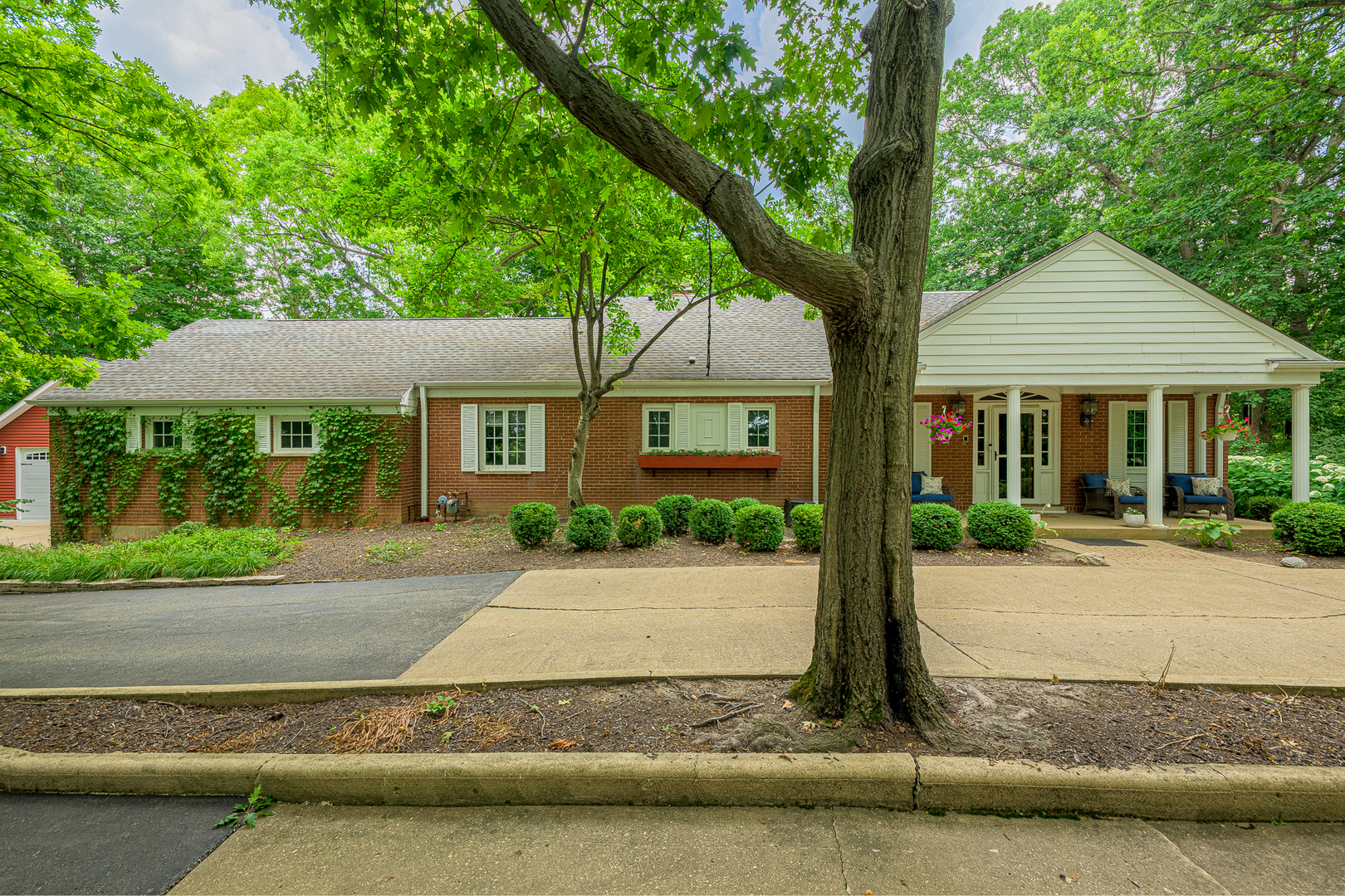 a front view of a house with porch