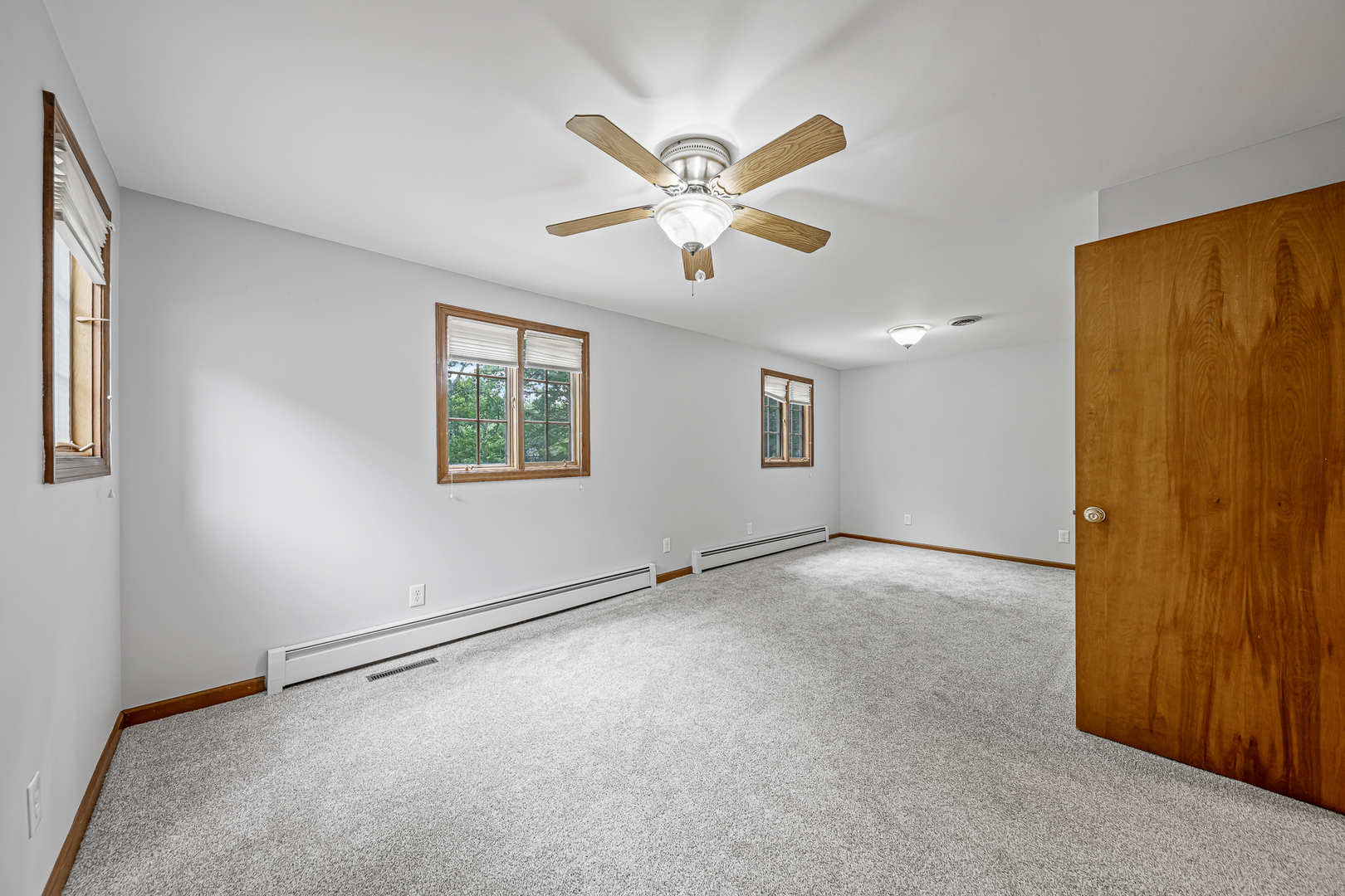 20735 Wolf Road Mokena, IL 60448 - Photo 12 of 22 a view of an empty room with a window