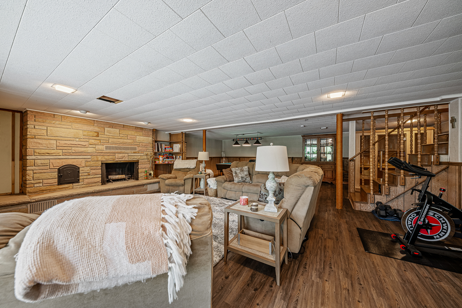 20735 Wolf Road Mokena, IL 60448 - Photo 14 of 22 a living room with furniture a fireplace and a flat screen tv