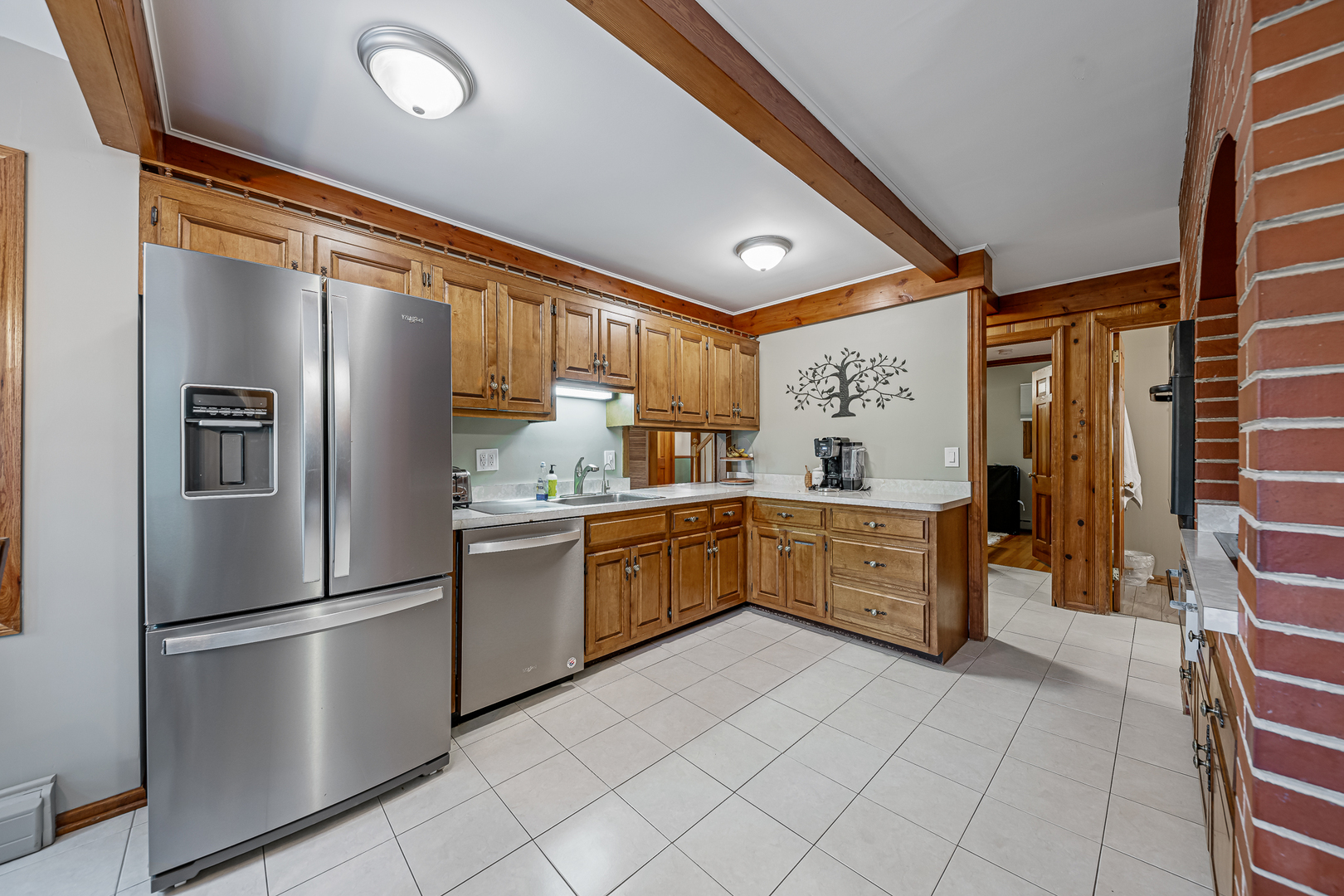 20735 Wolf Road Mokena, IL 60448 - Photo 6 of 22 a kitchen with a refrigerator and countertop