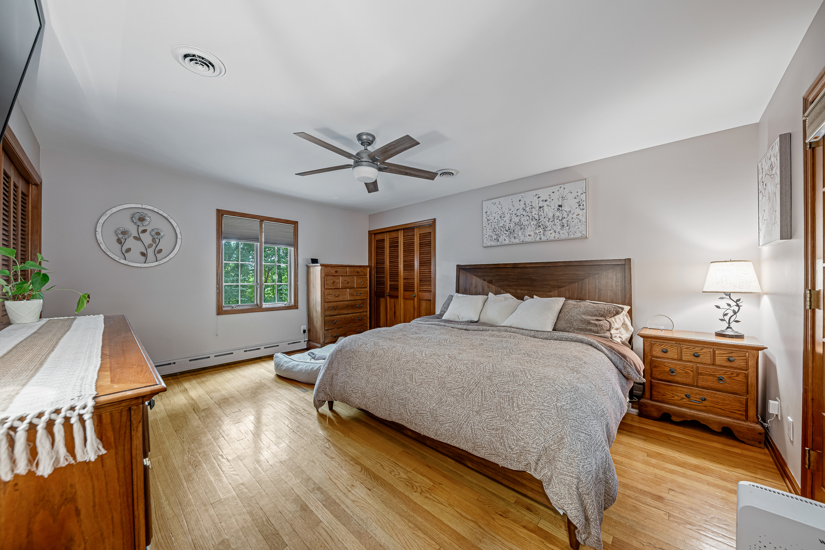 20735 Wolf Road Mokena, IL 60448 - Photo 8 of 22 a bedroom with a bed and a window