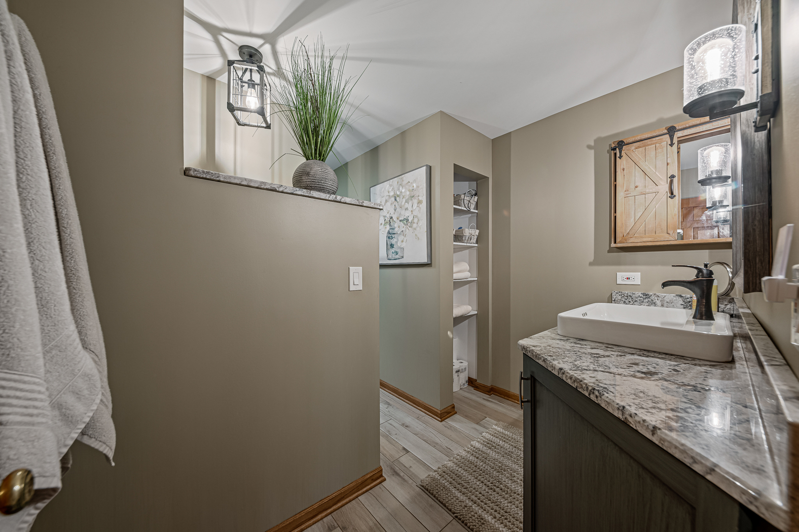 20735 Wolf Road Mokena, IL 60448 - Photo 10 of 22 a bathroom with a granite countertop sink a mirror and window