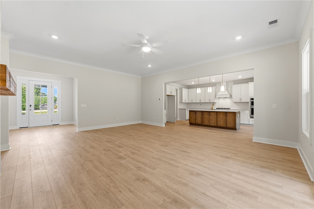 203 Timothy Court Anderson, SC 29621 - Photo 5 of 40 An open-concept living area with abundant space flows seamlessly into a modern kitchen.