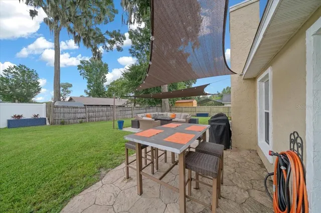 a view of outdoor space and yard