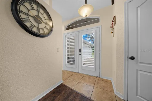 a living room with furniture or couch and a fireplace
