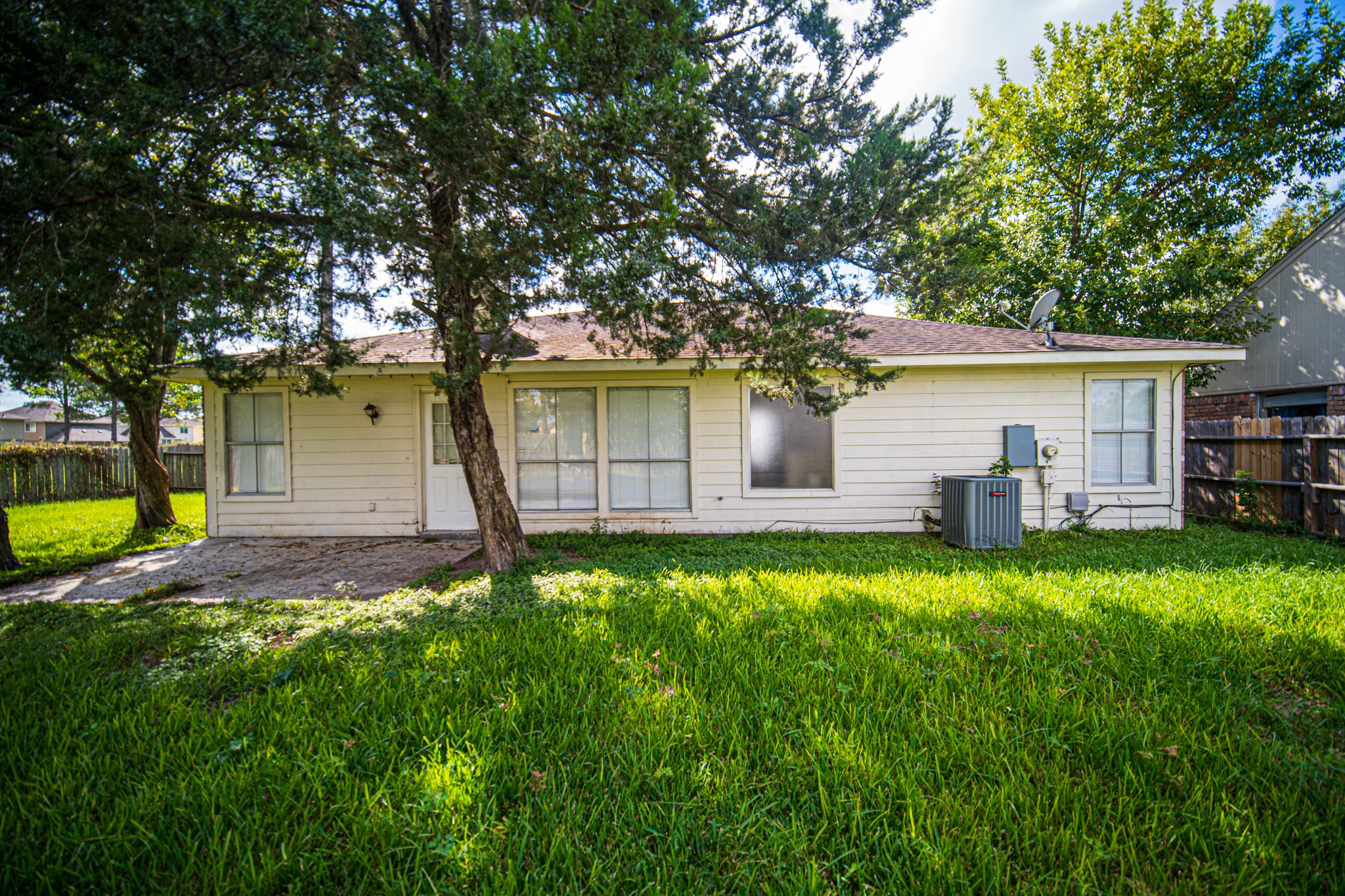13314 Sablewood Lane Houston, TX 77014 - Photo 12 of 12 a backyard of a house with seating and yard