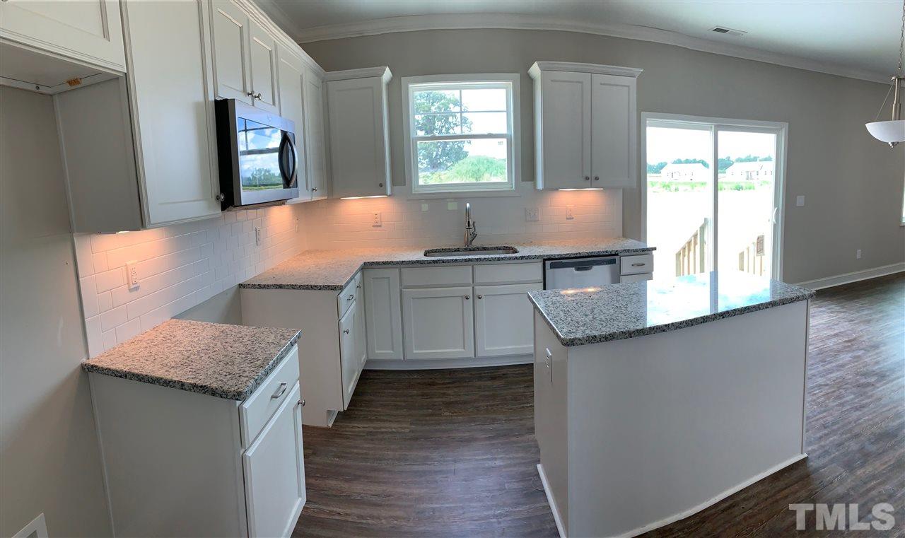 9750 Chapman Road Bailey, NC 27807 - Photo 3 of 13 Granite, LVP, Center Island