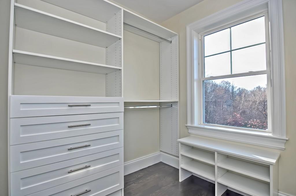50 Beatrice Way Canton, MA 02021 - Photo 16 of 29 a view of walk in closet with empty racks