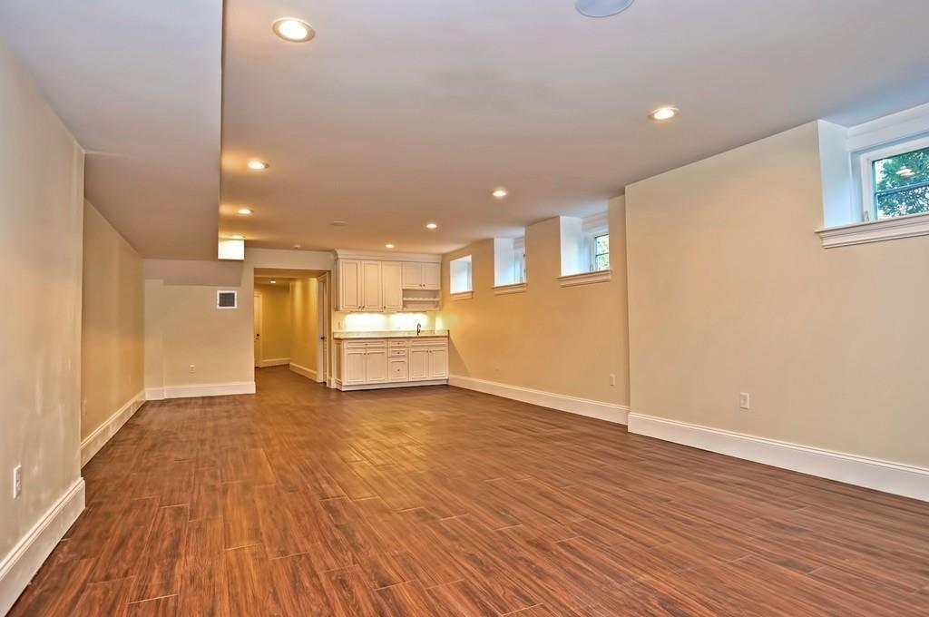 50 Beatrice Way Canton, MA 02021 - Photo 20 of 29 a view of a kitchen with a sink and a refrigerator