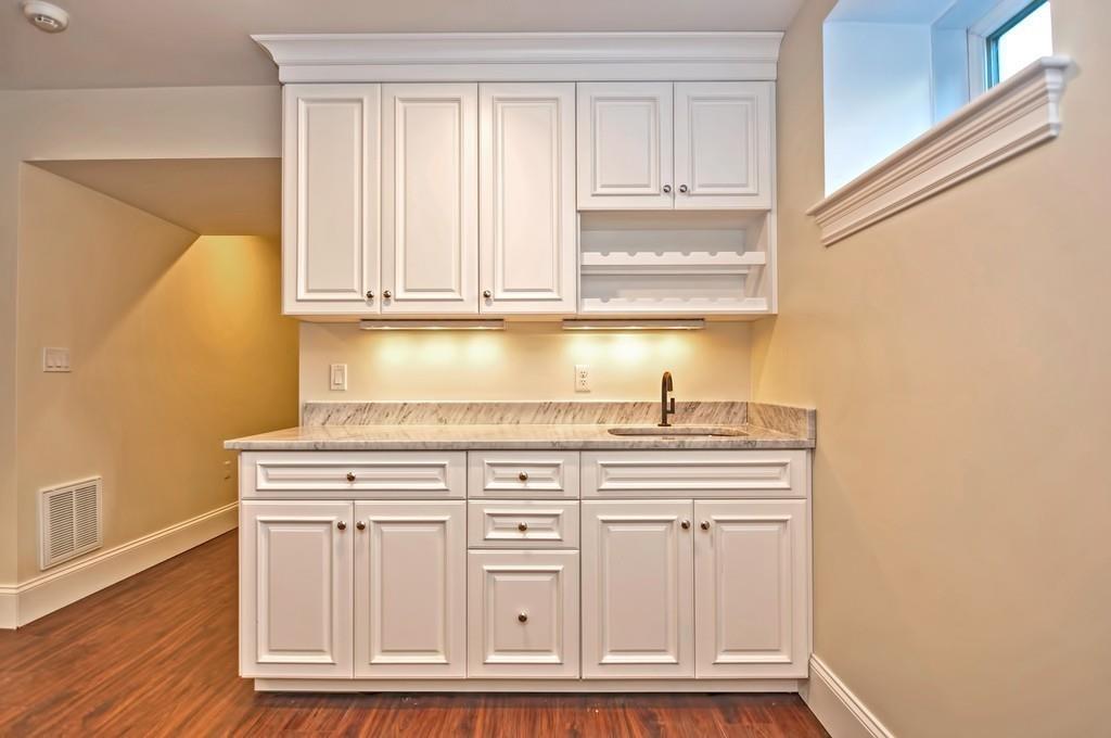 50 Beatrice Way Canton, MA 02021 - Photo 21 of 29 a view of cabinets with wooden floor