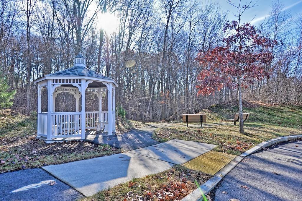 50 Beatrice Way Canton, MA 02021 - Photo 26 of 29 a front view of a house with garden