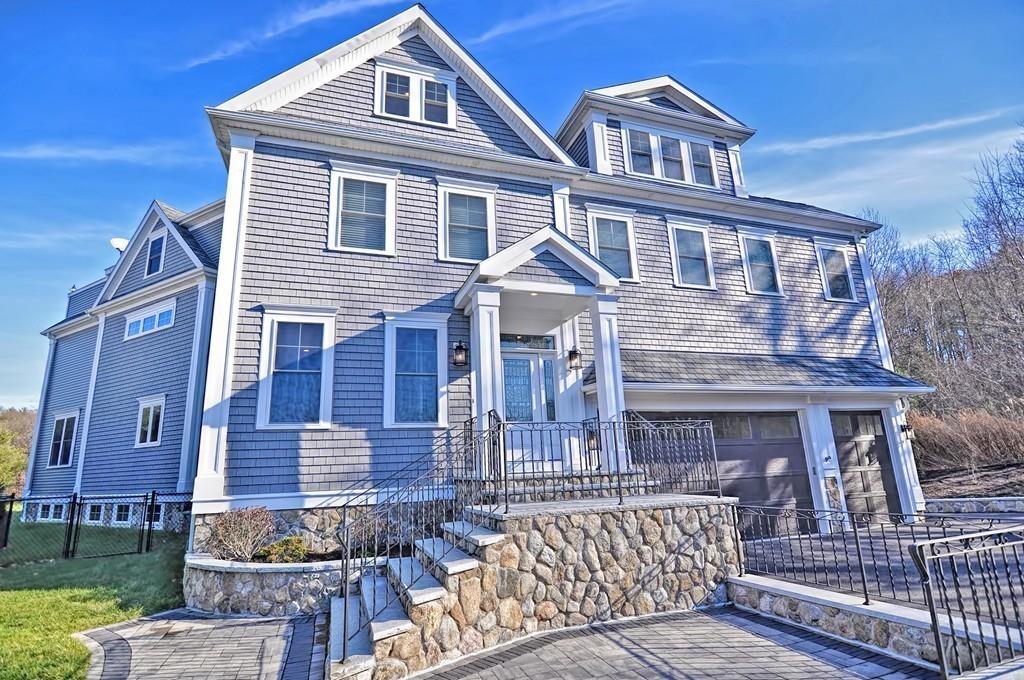 50 Beatrice Way Canton, MA 02021 - Photo 27 of 29 a front view of a house with a yard