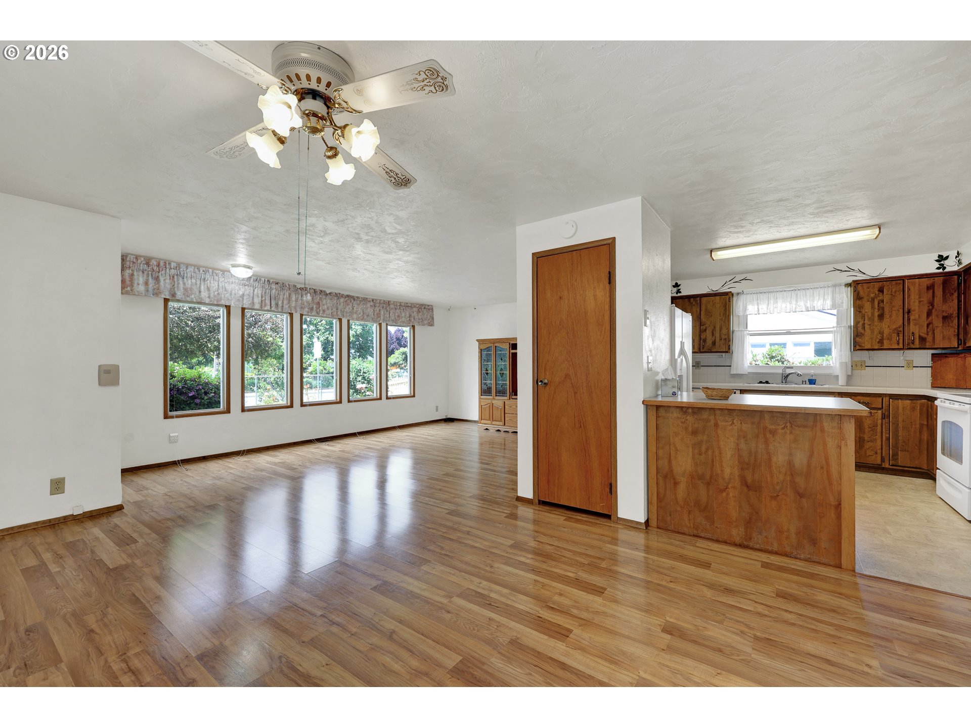 1425 Taney Street Eugene, OR 97402 - Photo 5 of 34 a view interior of a house wooden floor an entryway and livingroom