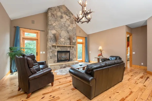 a bedroom with a large bed and a large window