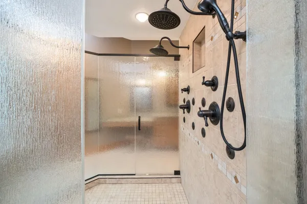 a kitchen with a refrigerator stove and cabinets