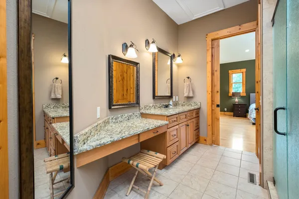 a kitchen with granite countertop a sink and a window