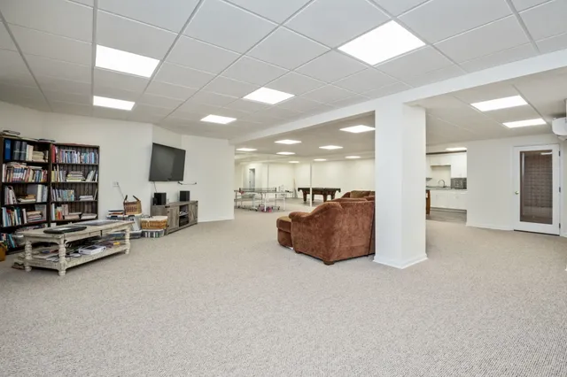 a white stove top oven sitting inside of a kitchen