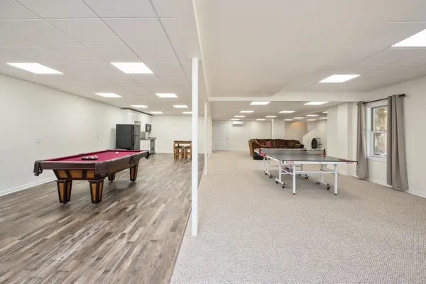a spacious bathroom with a tub and shower