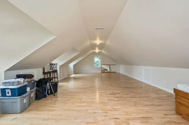 a spacious bathroom with a tub and shower