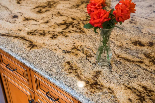 a roof deck with couch and chairs