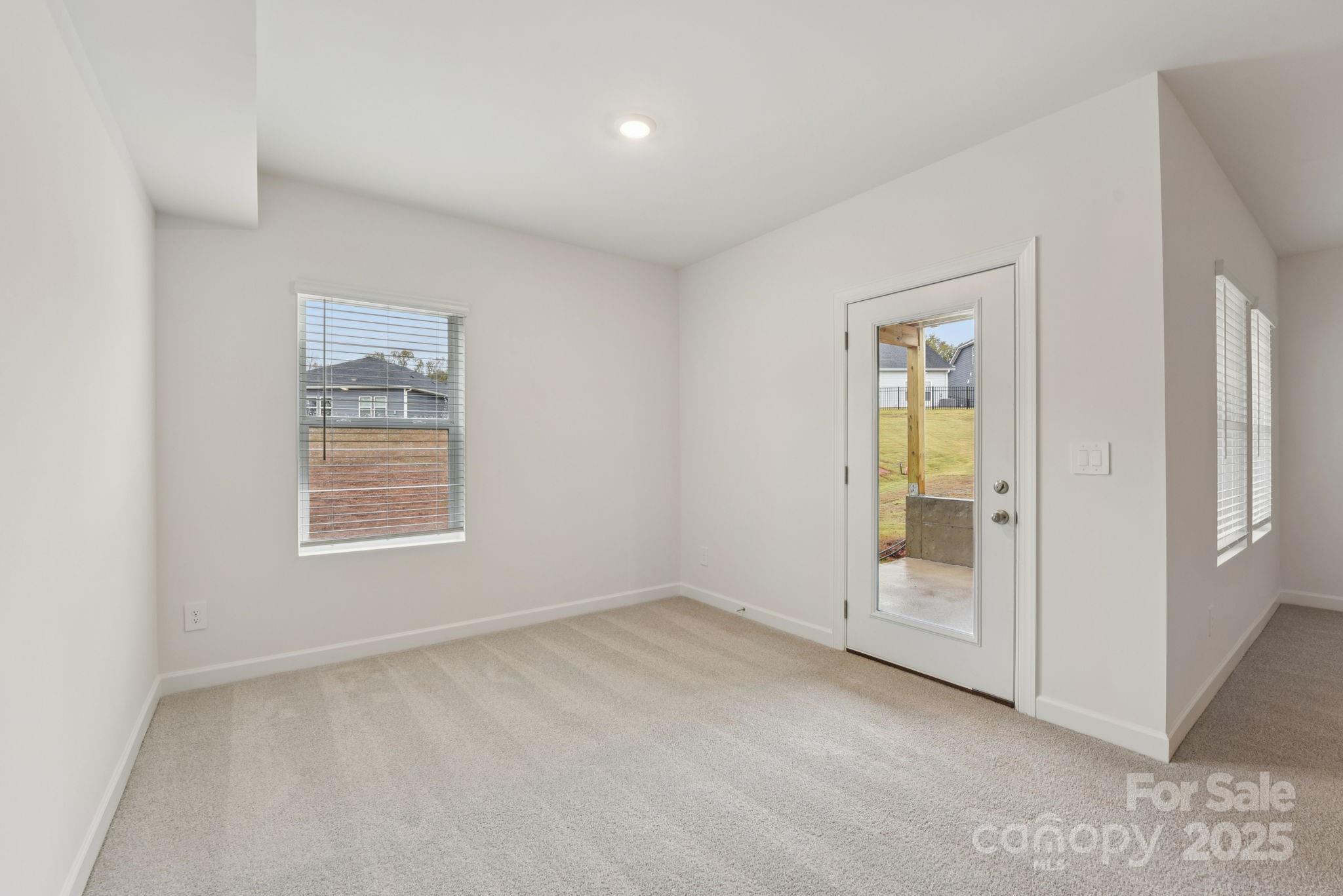 712 Palmer Pendleton Way York, SC 29745 - Photo 25 of 36 an empty room with windows and closet
