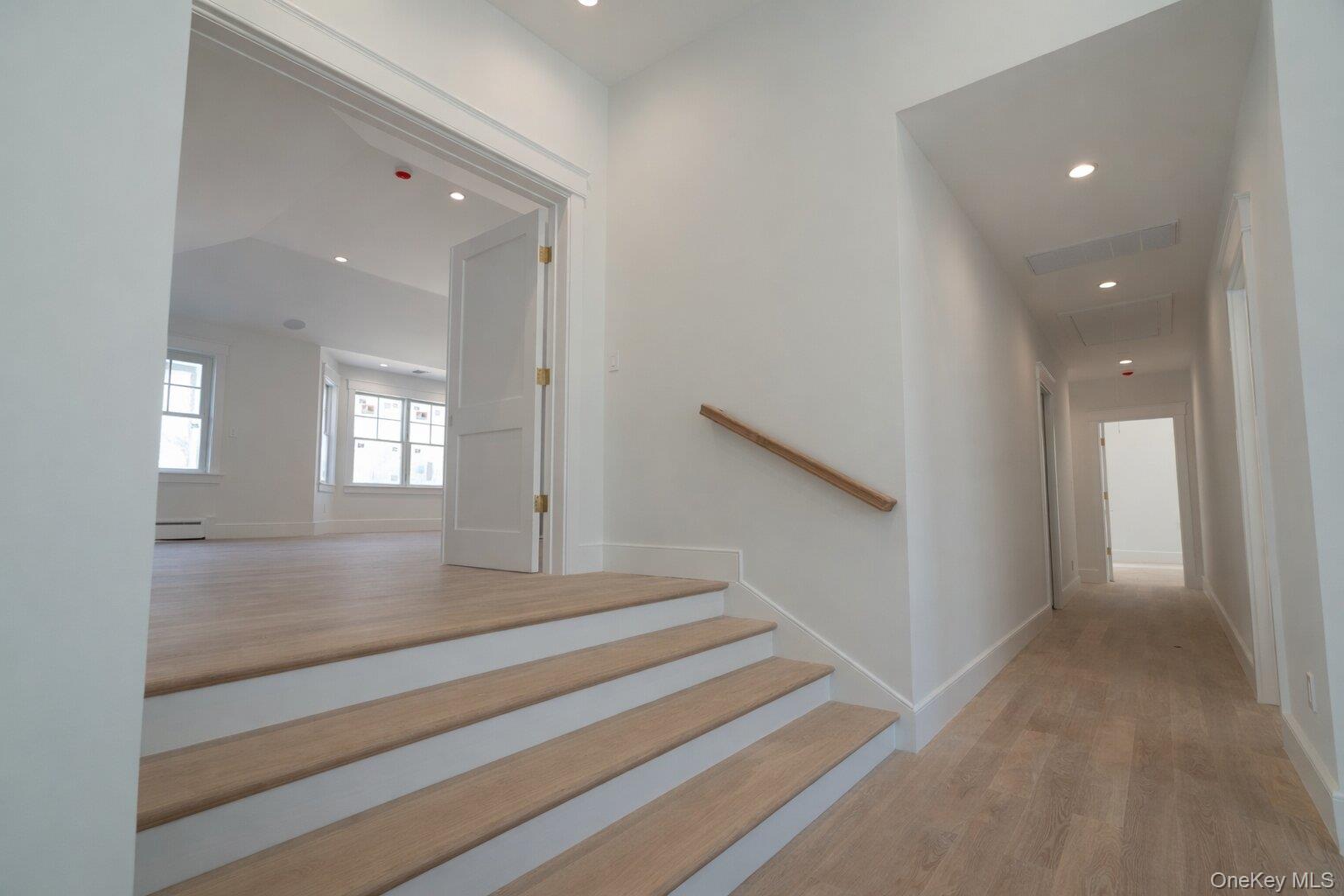 97 Aspatuck Road Westhampton Beach, NY 11978 - Photo 12 of 49 a view of entryway and hall with wooden floor