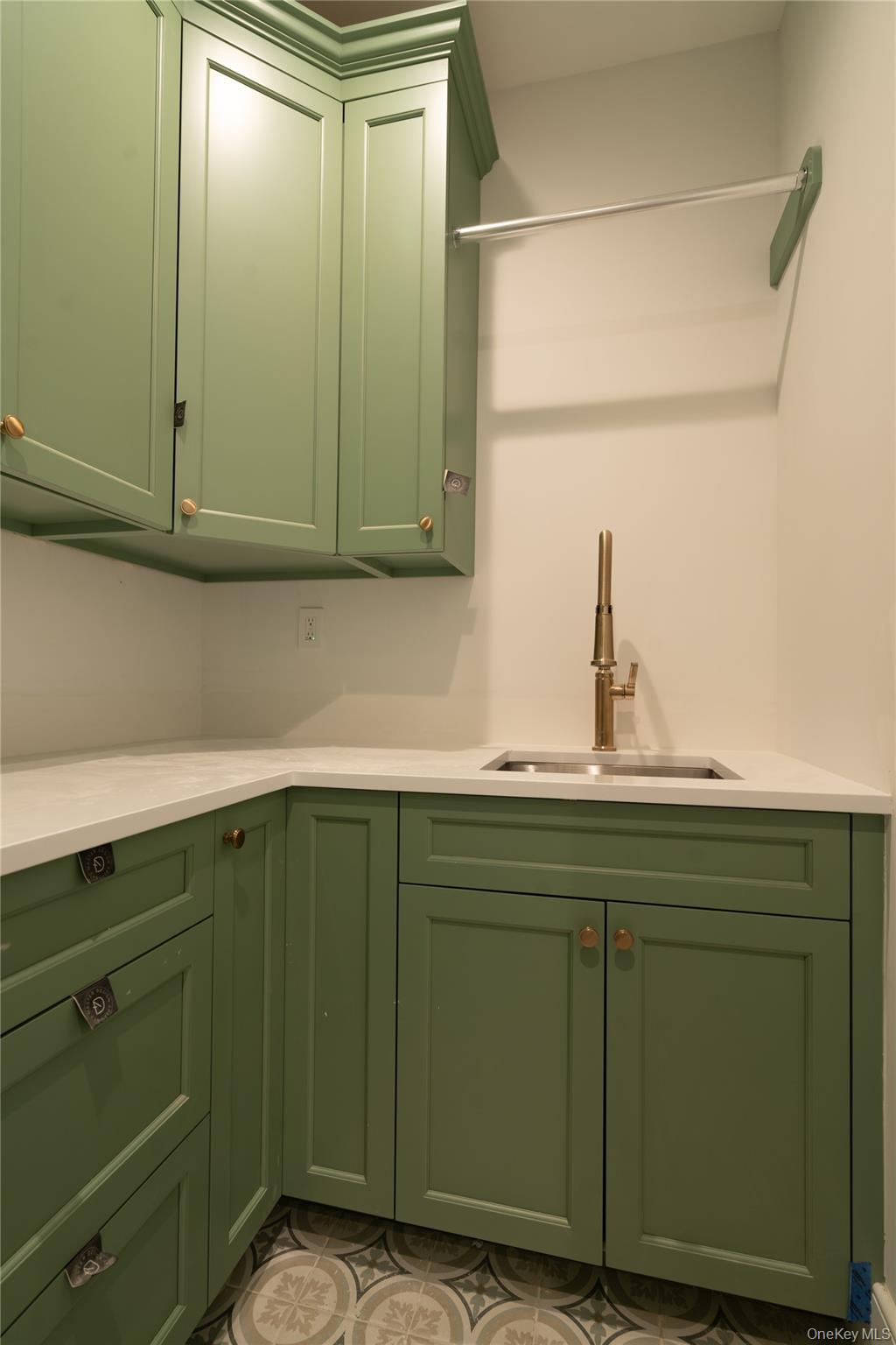 97 Aspatuck Road Westhampton Beach, NY 11978 - Photo 42 of 49 a bathroom with a sink and vanity