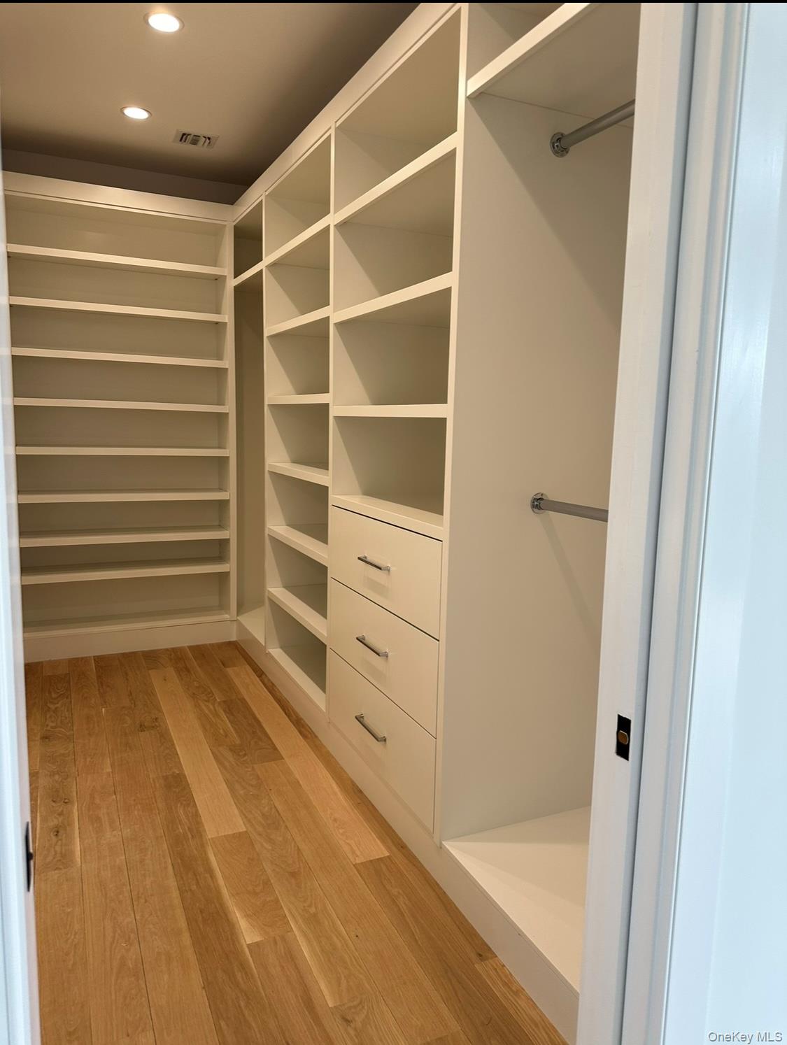 97 Aspatuck Road Westhampton Beach, NY 11978 - Photo 48 of 49 a view of walk in closet with empty racks