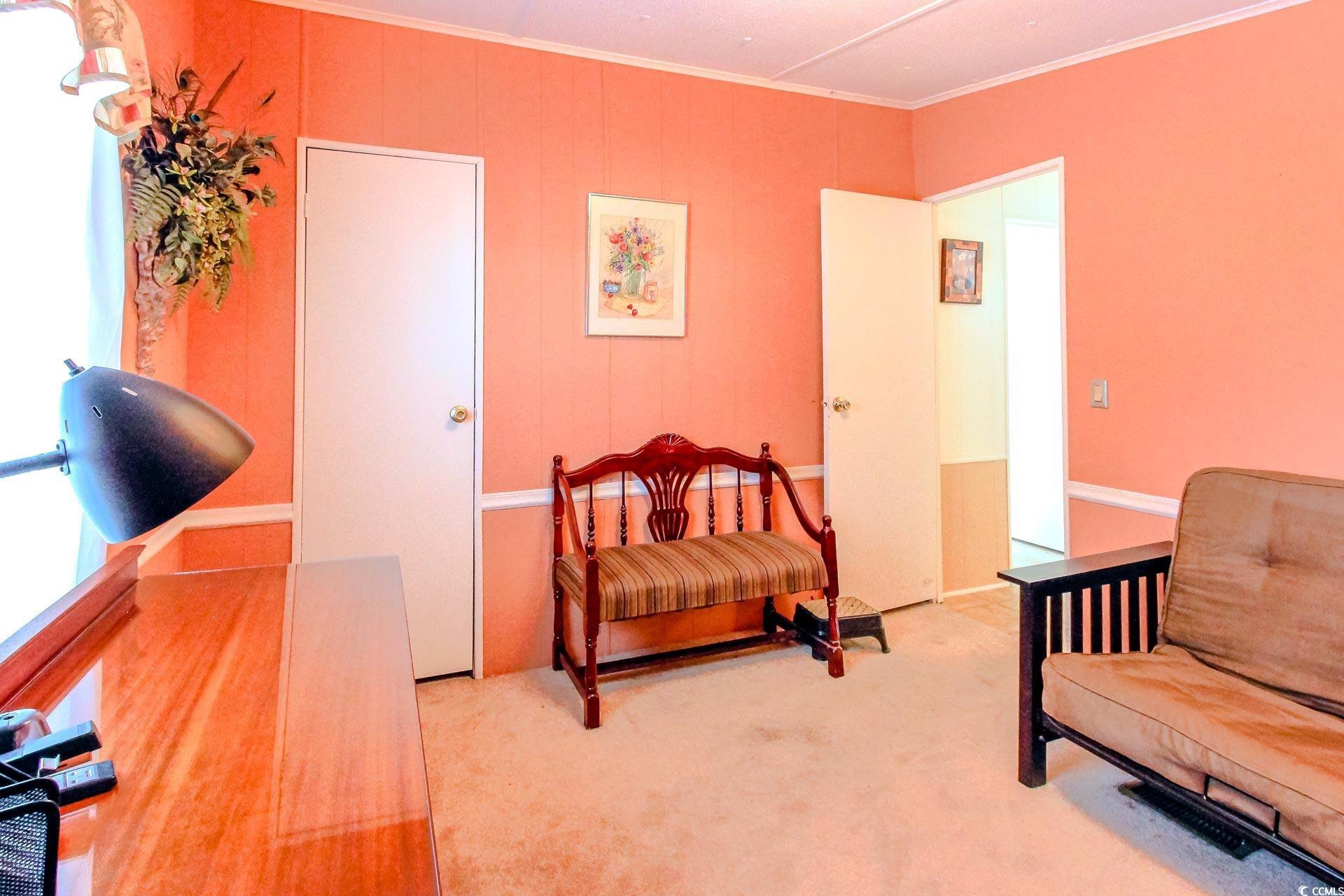 163 Crooked Island Circle Murrells Inlet, SC 29576 - Photo 23 of 40 Bedroom with crown molding and light colored carpet