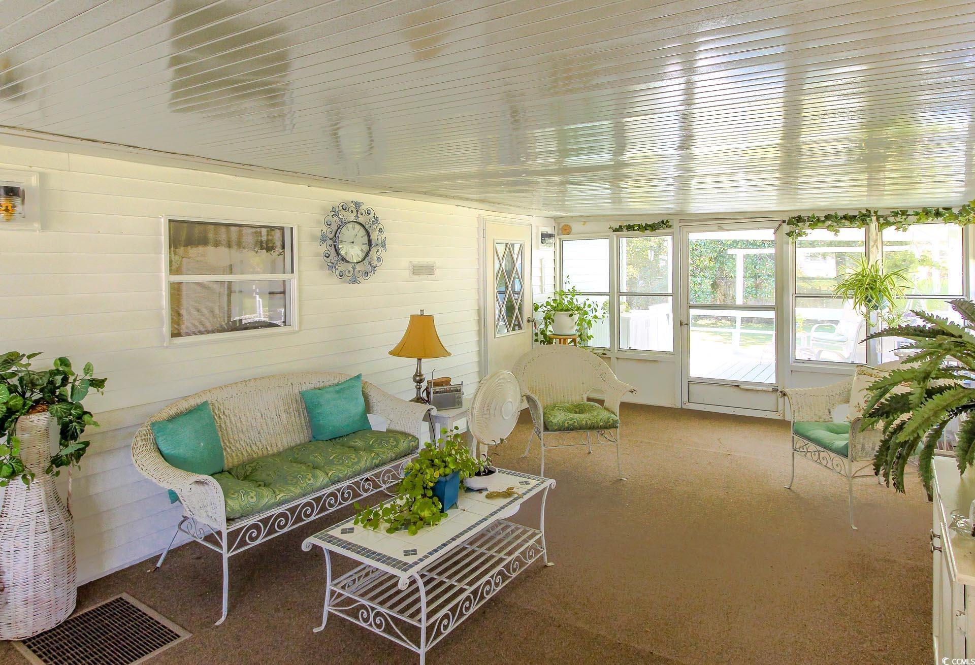 163 Crooked Island Circle Murrells Inlet, SC 29576 - Photo 25 of 40 Sunroom / solarium featuring carpet