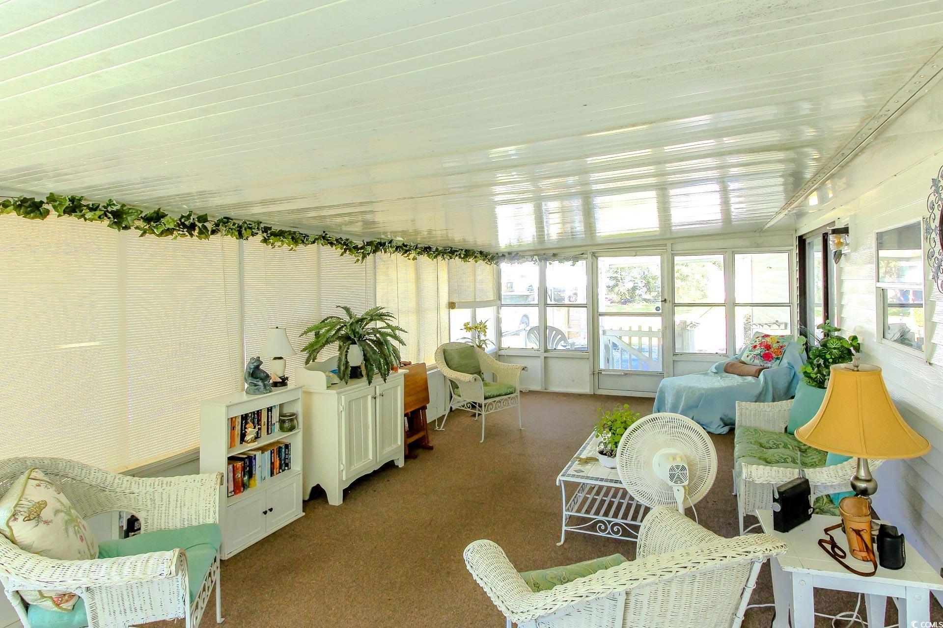 163 Crooked Island Circle Murrells Inlet, SC 29576 - Photo 26 of 40 Sunroom featuring carpet and french doors