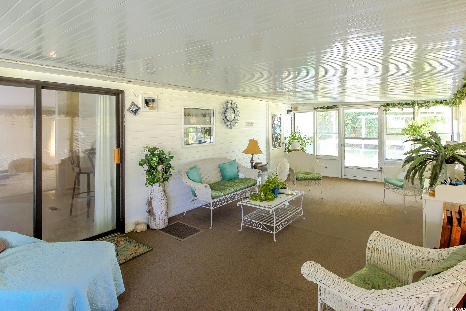 163 Crooked Island Circle Murrells Inlet, SC 29576 - Photo 27 of 40 Sunroom / solarium with carpet floors