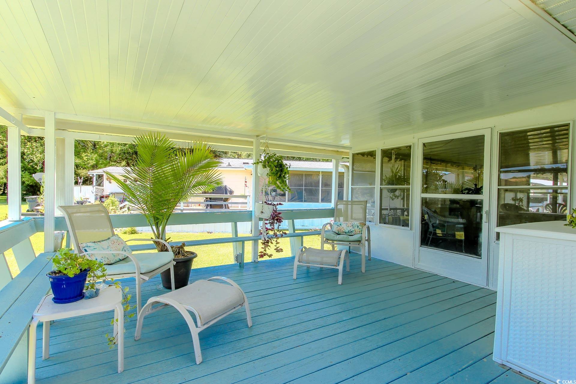163 Crooked Island Circle Murrells Inlet, SC 29576 - Photo 30 of 40 View of wooden deck