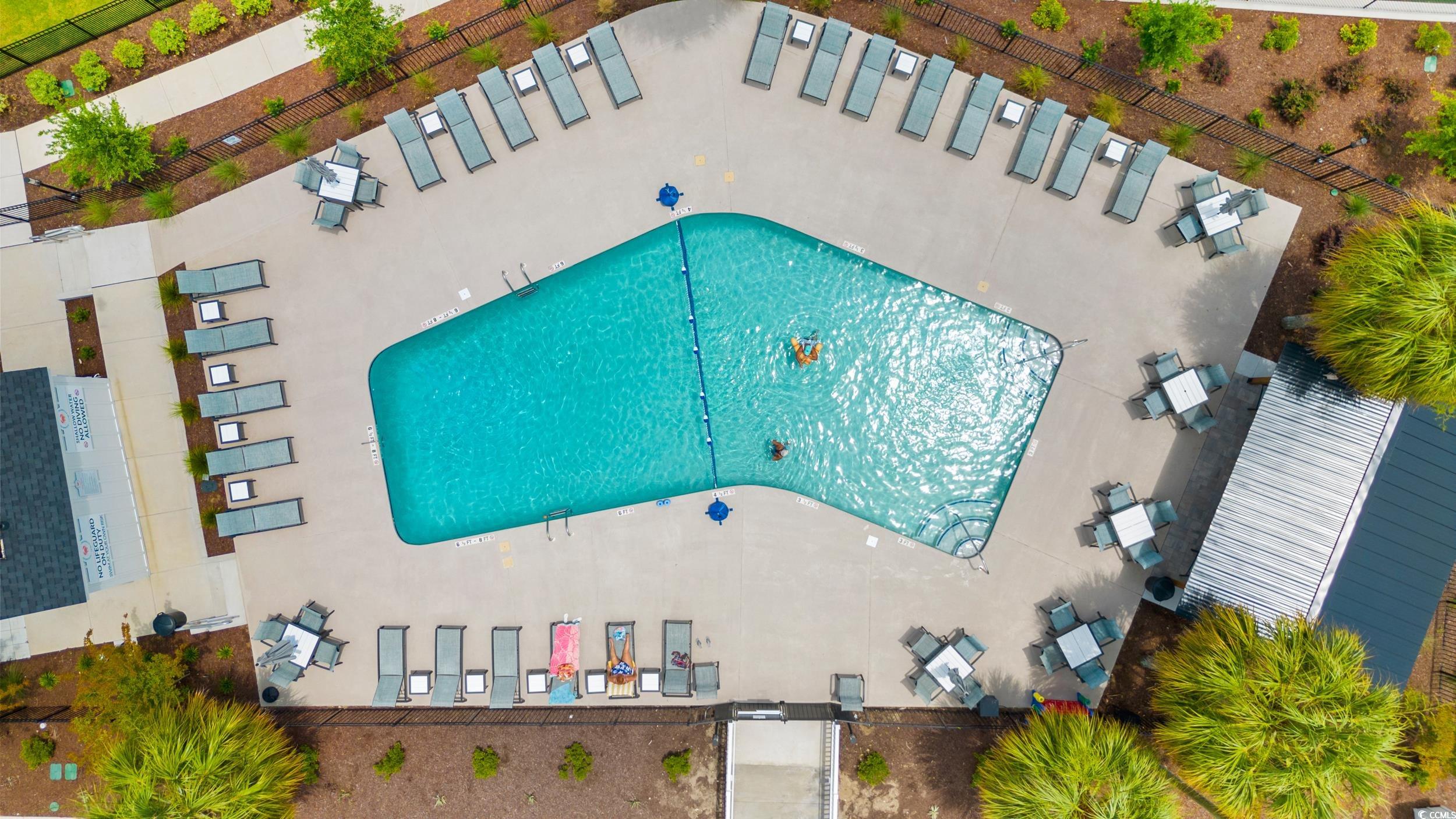 163 Crooked Island Circle Murrells Inlet, SC 29576 - Photo 38 of 40 Drone / aerial view of a pool