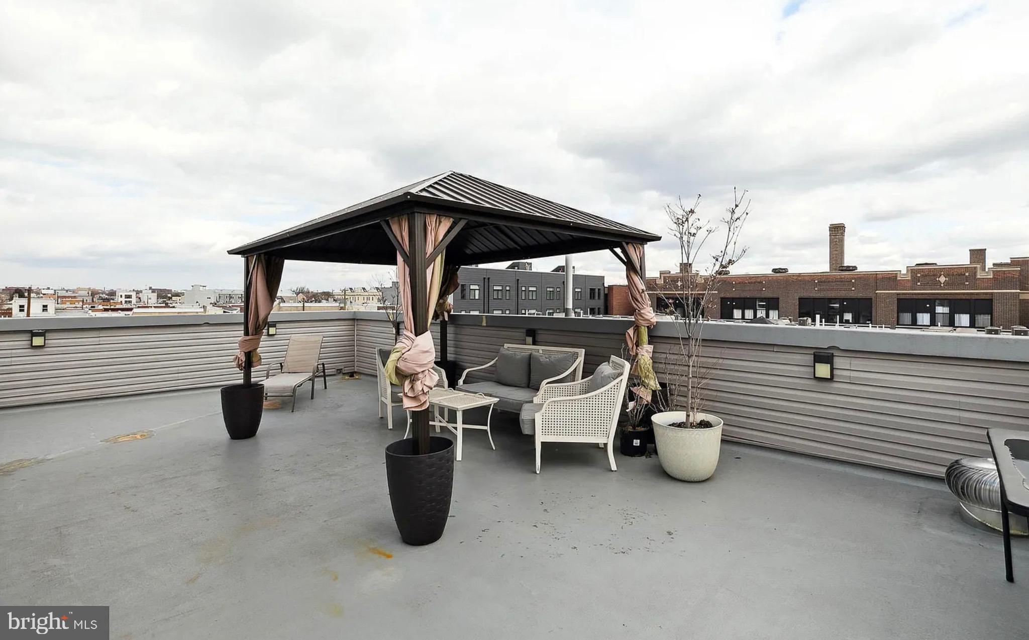 2813 Tilton Street Philadelphia, PA 19134 - Photo 26 of 33 a view of two chairs in the roof deck